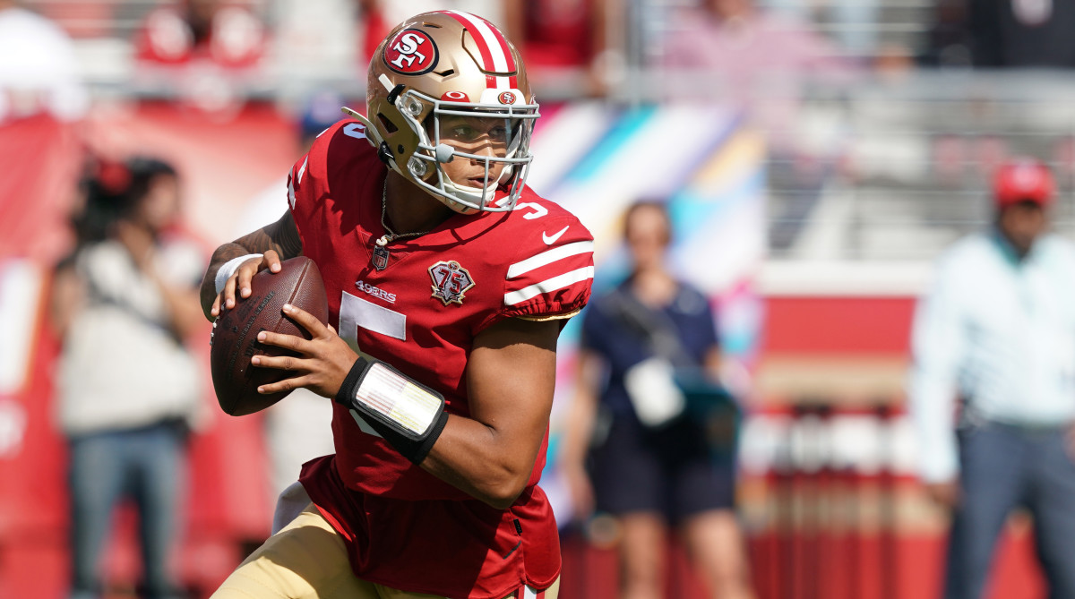 49ers quarterback Trey Lance throws a pass during the third quarter against the Seahawks .